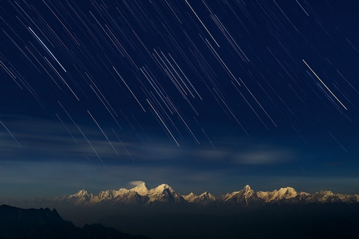 Star trails over snow-capped Himalayas in China