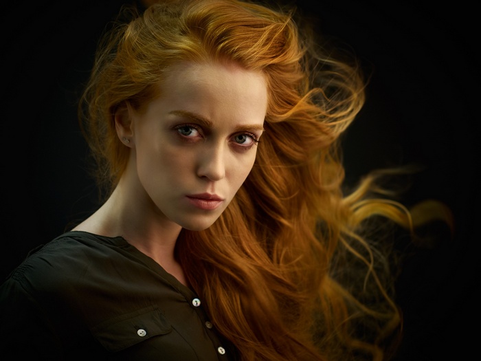 Portrait of a redhead woman with flowing hair