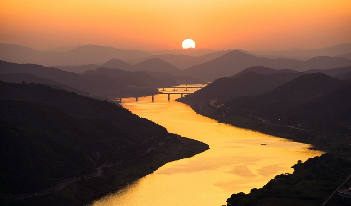 Sunset over mountains and river in South Korea