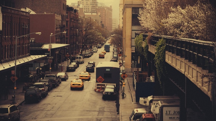 New York City street with yellow cabs and buildings
