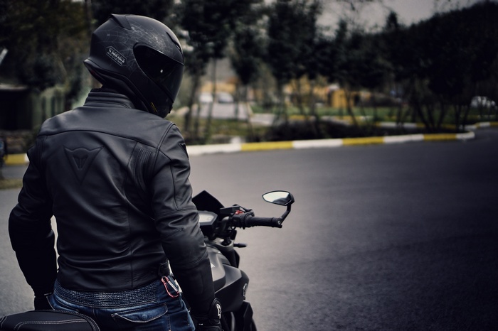 Man in Dainese jacket on Yamaha motorcycle