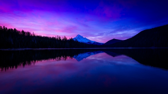 Mountain reflected in a lake at sunset