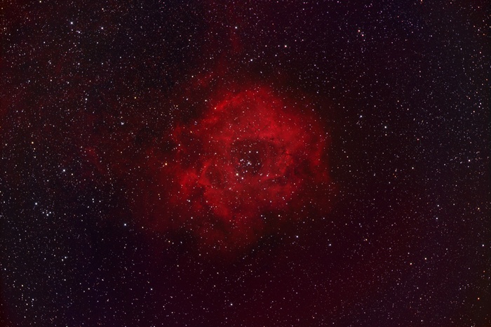 Rosette Nebula in deep space with stars