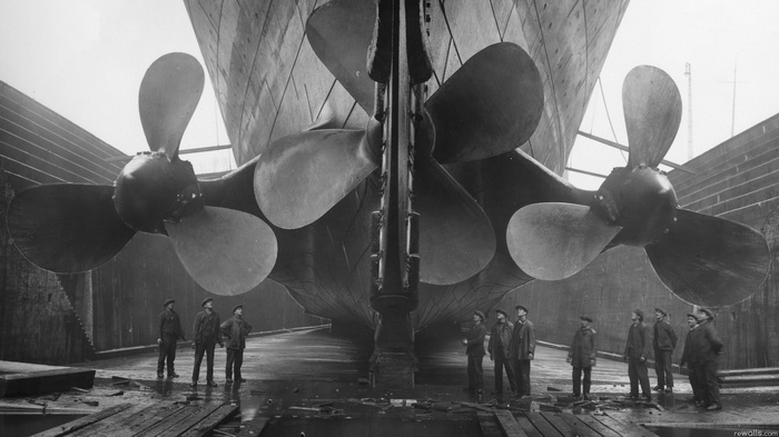 Titanic propellers and workers in dry dock