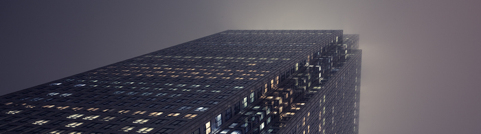 Skyscraper in London shrouded in mist at night