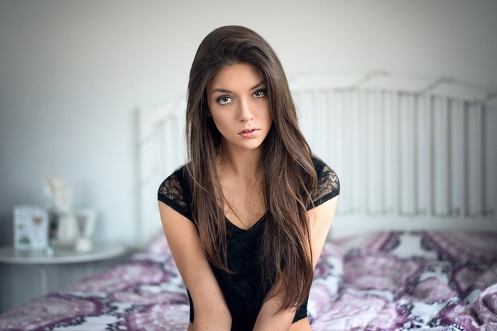 Portrait of Marie Zoé on a bed