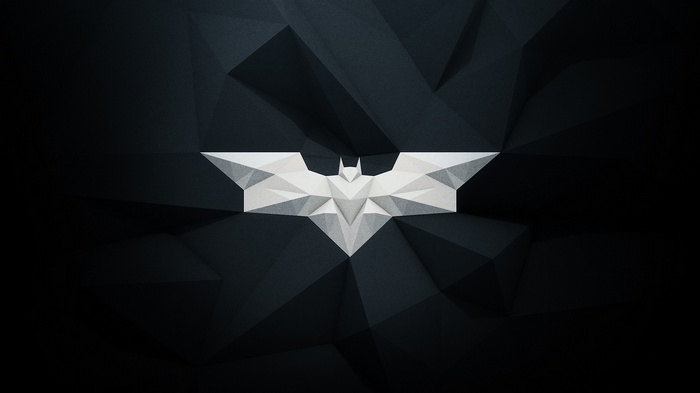 The Batman logo in a dark, geometric design