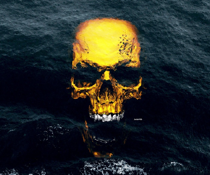 Golden skull emerging from dark ocean waves
