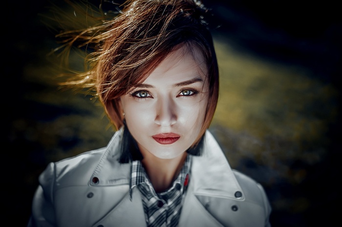Portrait of a woman with red hair