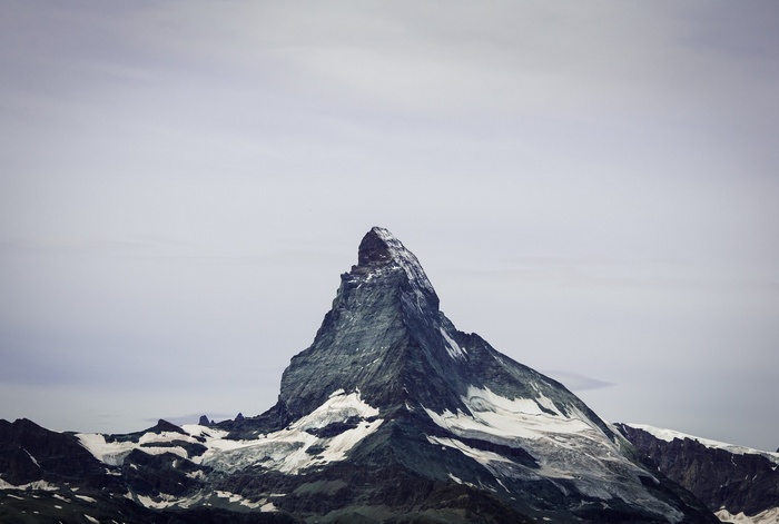 The Matterhorn mountain with snow and mist