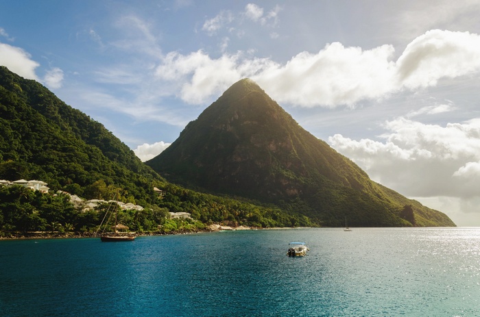The Pitons mountains and boats in the sea