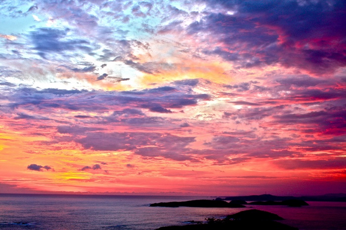 Colorful sunset over islands and the sea