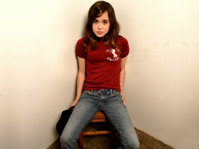 Ellen Page sitting on a stool