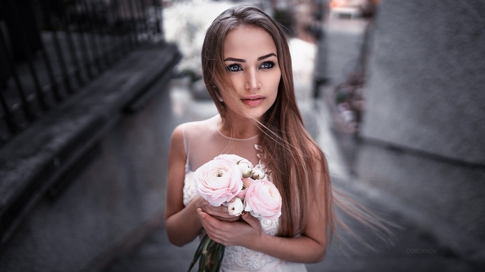 Portrait of a woman with flowers by Ivan Gorokhov