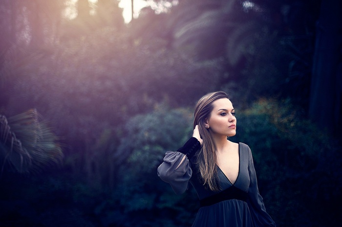 Woman in a dress in a forest