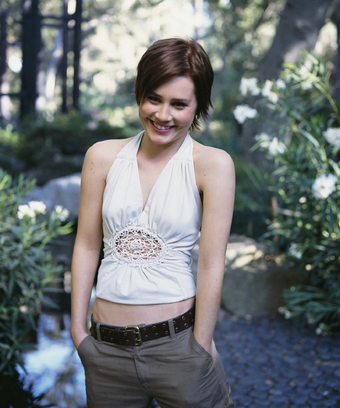 Alison Lohman smiling in a garden