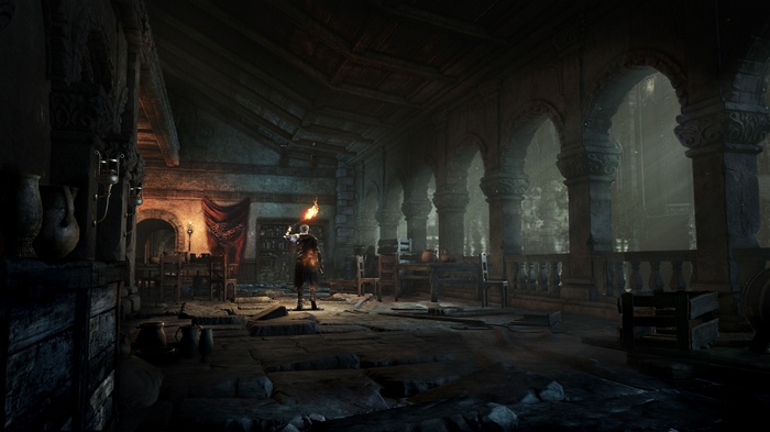 Dark Souls III knight with torch in ruined hall