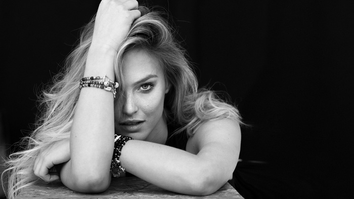 Bar Refaeli posing with bracelets