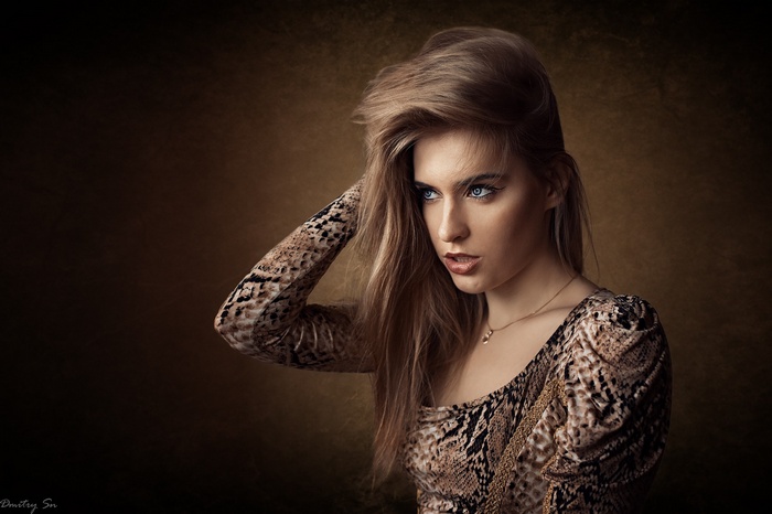 Portrait of a woman with blue eyes and long hair