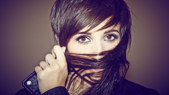 Valerie Poxleitner with long brown hair covering her face