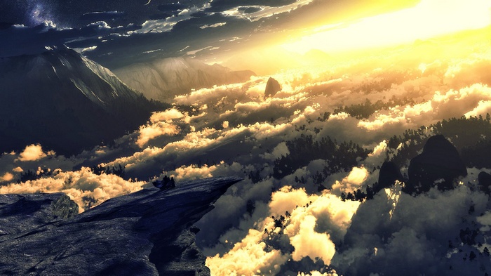 Sunset over clouds and mountains