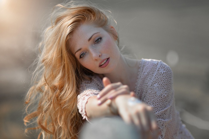 Redhead woman with blue eyes portrait