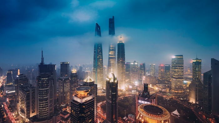 Shanghai skyline at night with tall skyscrapers