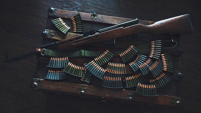 SKS rifle with stripper clips and ammunition