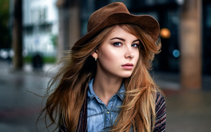 Portrait of a woman wearing a hat by Irina Popova