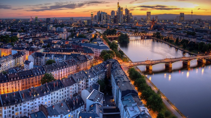 Frankfurt skyline at sunset over the Main River
