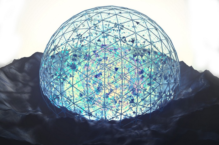 Blue geometric sphere on rocky terrain