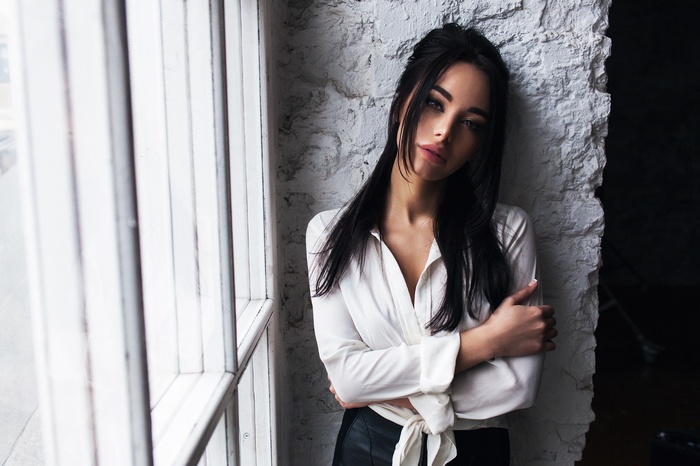 Portrait of a woman with black hair by Sergey Shumilov