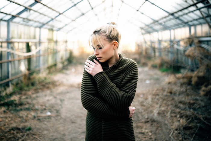 Woman in a greenhouse