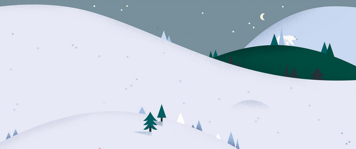 Polar bear walks on snowy hills at night