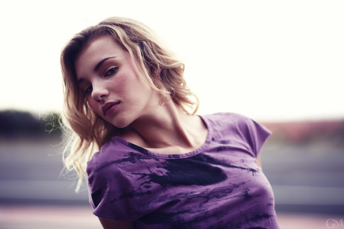 Rachel Ann Yampolsky wearing a purple t-shirt