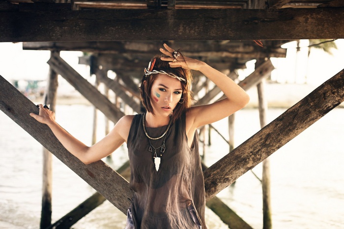 Ekaterina Ivanchikova under a wooden pier