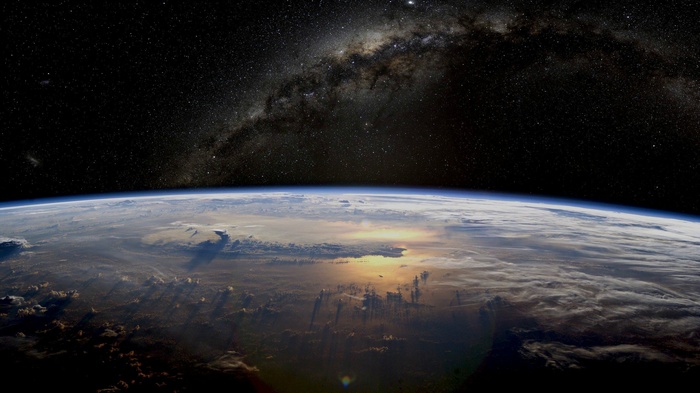 Earth and the Milky Way galaxy from space