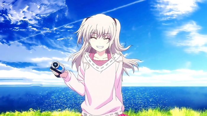 Tomori Nao from Charlotte holding a camcorder