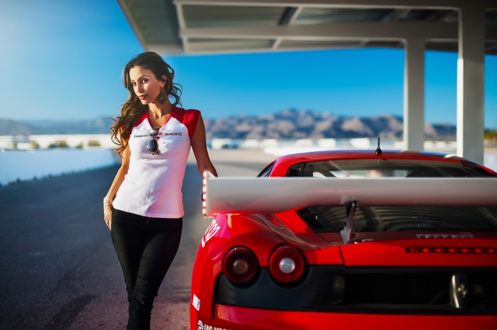 Janice Kakish with a red Ferrari F430