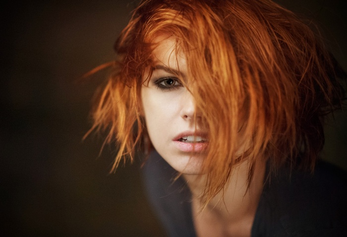 Portrait of a redhead woman with brown eyes