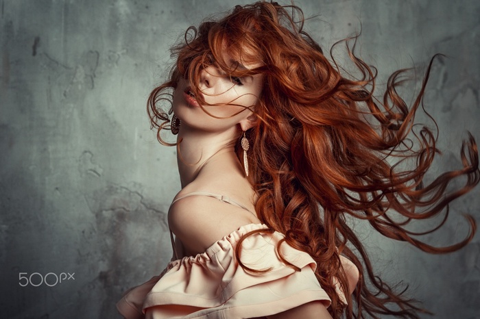 Liliya Nazarova with flowing red hair