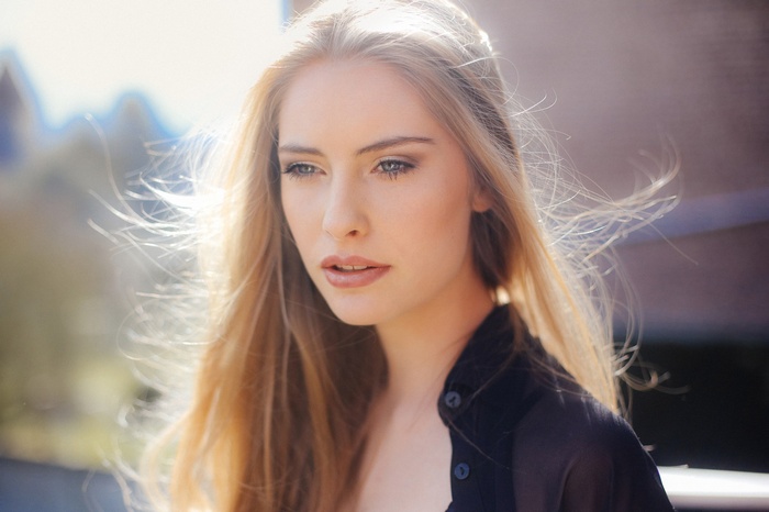 Portrait of a blonde woman with blue eyes