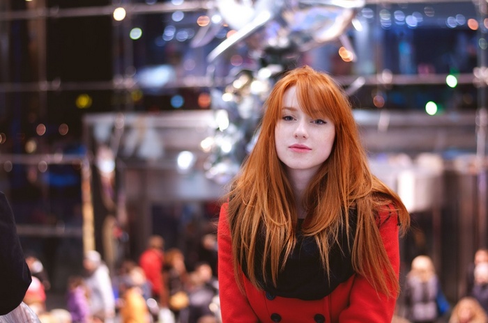 Alina Kovalenko in a red coat