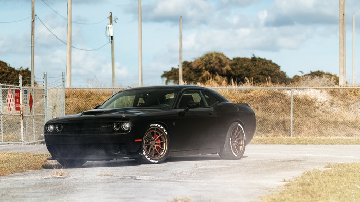 Black Dodge Challenger SRT Hellcat on a road