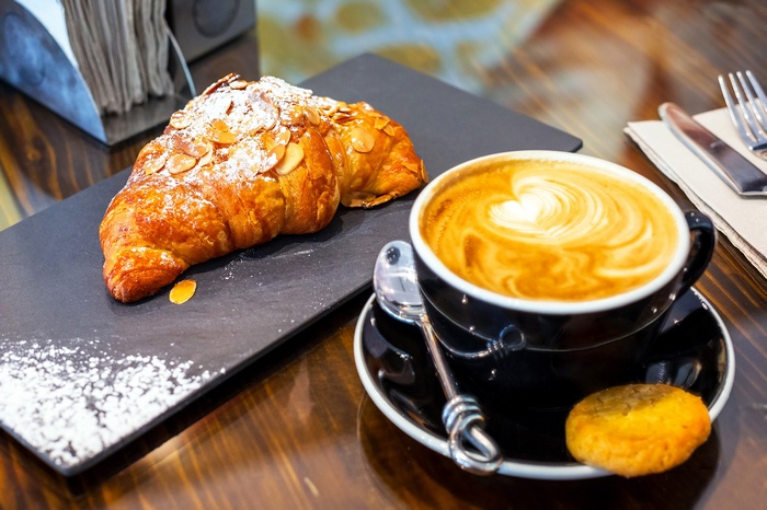 Almond Croissant and Latte Art Coffee