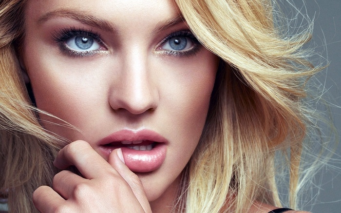 Candice Swanepoel close-up portrait with blonde hair