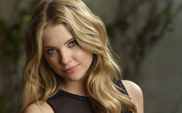 Ashley Benson with blonde wavy hair