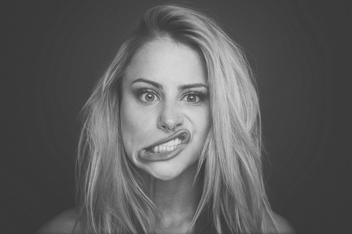 Woman with nose piercing making a funny face
