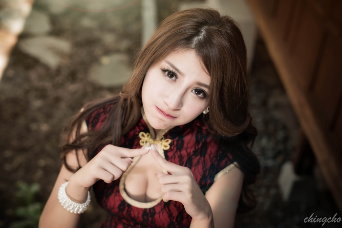 Taiwanese woman in traditional red and black dress