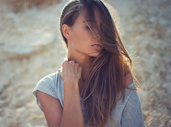 Woman with hair in face